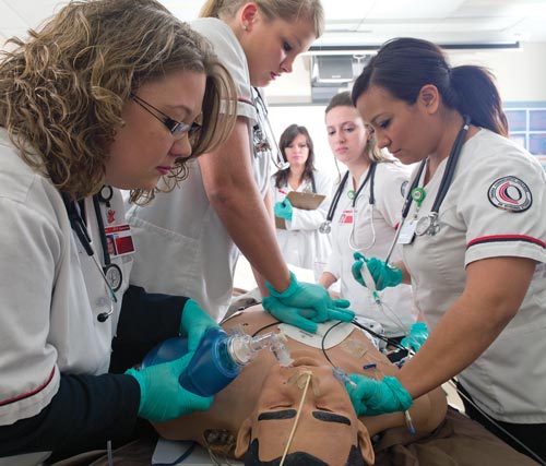 Owens Community College Nursing students work on a lesson. National Nurse Week is May 6-12. Photo courtesy Owens Community College