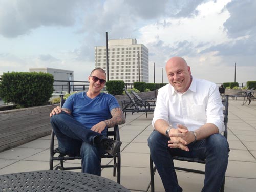 La Salle Apartments residents Nick Amrhein, left, and Michael Seay enjoy the downtown building's rooftop patio. Toledo Free Press Photo by Sarah Ottney