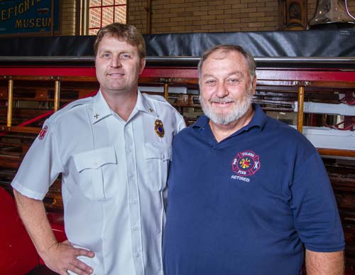 Battalion Chief Mike Nicely and his father retired Capt. Pat Nicely of Toledo Fire & Rescue Department. Toledo Free Press photo by Aaron Geller