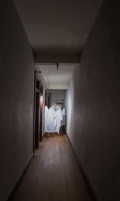 Collingwood Arts Center Interim Executive Director Sarah Kurfis and Special Events Coordinator Lexi Staples have fun dressed as ghosts to promote CAC’s upcoming ghost hunts. Toledo Free Press Photo by Christie Materni