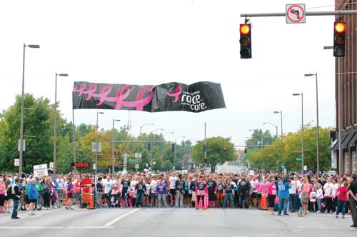 The Toledo race for the cure will be Sept. 28 and includes a 5K chipped time run, a 5K walk and a one-mile family walk with a kids’ activity area. Photo courtesy Race for the Cure / Cover Photo by Mary Pencheff Photography