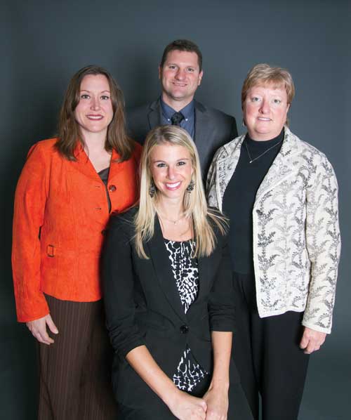 Clockwise from left, Renee Palacios of Family House, Andy Hudak of TransAmerica Financial Advisers, Carol Smith of Family Service of Northwest Ohio and Attorney Amanda Coyle. Toledo Free Press photo by Christie Materni