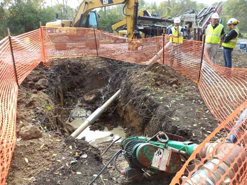 Jason Copsey, Chris Kozak and Tammy Wheeler of Columbia Gas of Ohio at the site of the pipeline upgrade in Maumee. Toledo Free Press photo by Tom Konecny