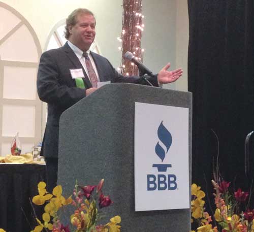 Brad Lay Sr. of Lay's Transmission speaks at the BBB Torch Awards after winning a business ethics award in the small business category. Toledo Free Press photo by Sarah Ottney