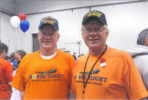 Twin brothers Harold, left, and Howard Yunker, both of Swanton, at the Honor Flight Northwest Ohio welcome home ceremony Oct. 29 at Grand Aire terminal. Howard was on the flight. Harold was on an Honor Flight in 2012. Both are Vietnam veterans. Photo Courtesy Yunker Family