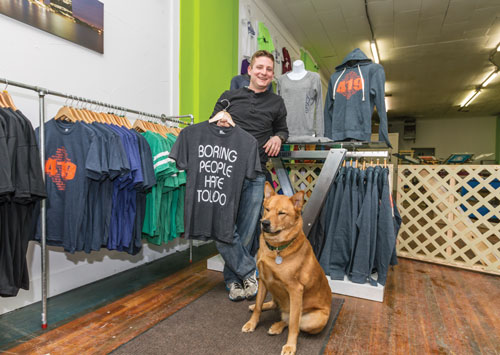 n Max Reddish of Reddish Printing, with dog Red, opened HIS SHOP at 1503 Adams St. in OCTOBER. TOLEDO FREE PRESS PHOTO By CHRISTIE MATERNI