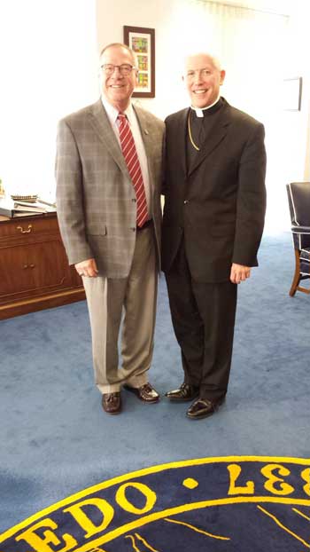 n TOLEDO MAYOR D. MICHAEL COLLINS, With Toledo Bishop Daniel Thomas, WAS A DEVOUT CATHOLIC WHOSE FAITH INFORMED HIS COMPASSIONATE OUTLOOK. PHOTO COURTESY CATHOLIC DIOCESE OF TOLEDO