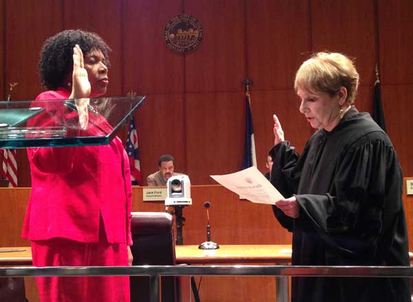 Paula Hicks-Hudson, left, is sworn in as Toledo mayor by Judge Arlene Singer of the Sixth District Court of Appeals during a ceremony Feb. 17. Toledo Free Press Photo by Sarah Ottney