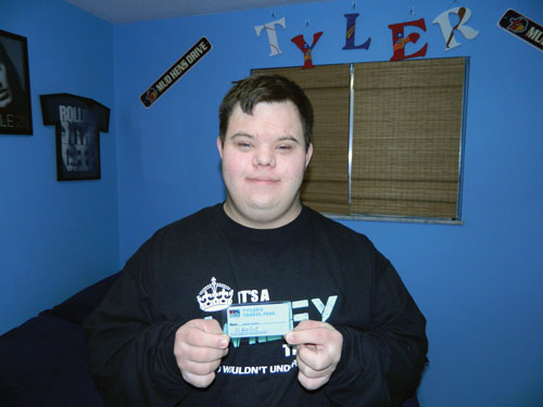Rogers High School graduate Tyler Wiley of Toledo inspired Toledo Public Schools to offer tyler’s travel pass to district residents with disabilities, allowing free entry to regular season games and other events. TOLEDO FREE PRESS PHOTO BY ASHLEY MCMAHON