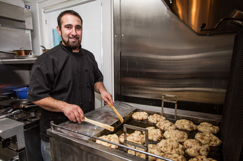 Holey Toledough owner Chris Ritter is preparing to start selling his gourmet doughnuts in coffee shops and other spots throughout the area. Toledo free press star photo by Christie materni